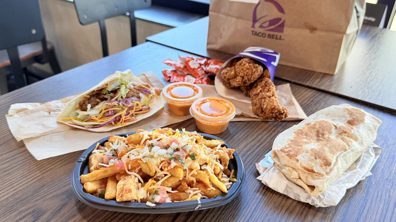 Collection of new menu items on table at Taco Bell
