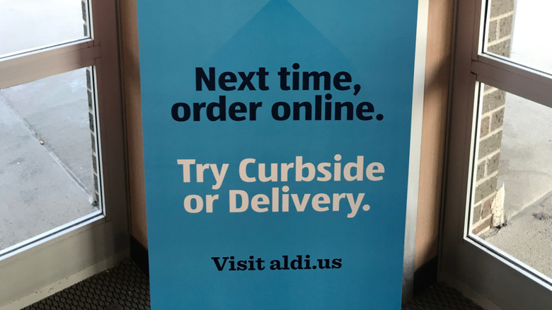 Sign in an Aldi store notifying customers they can order online